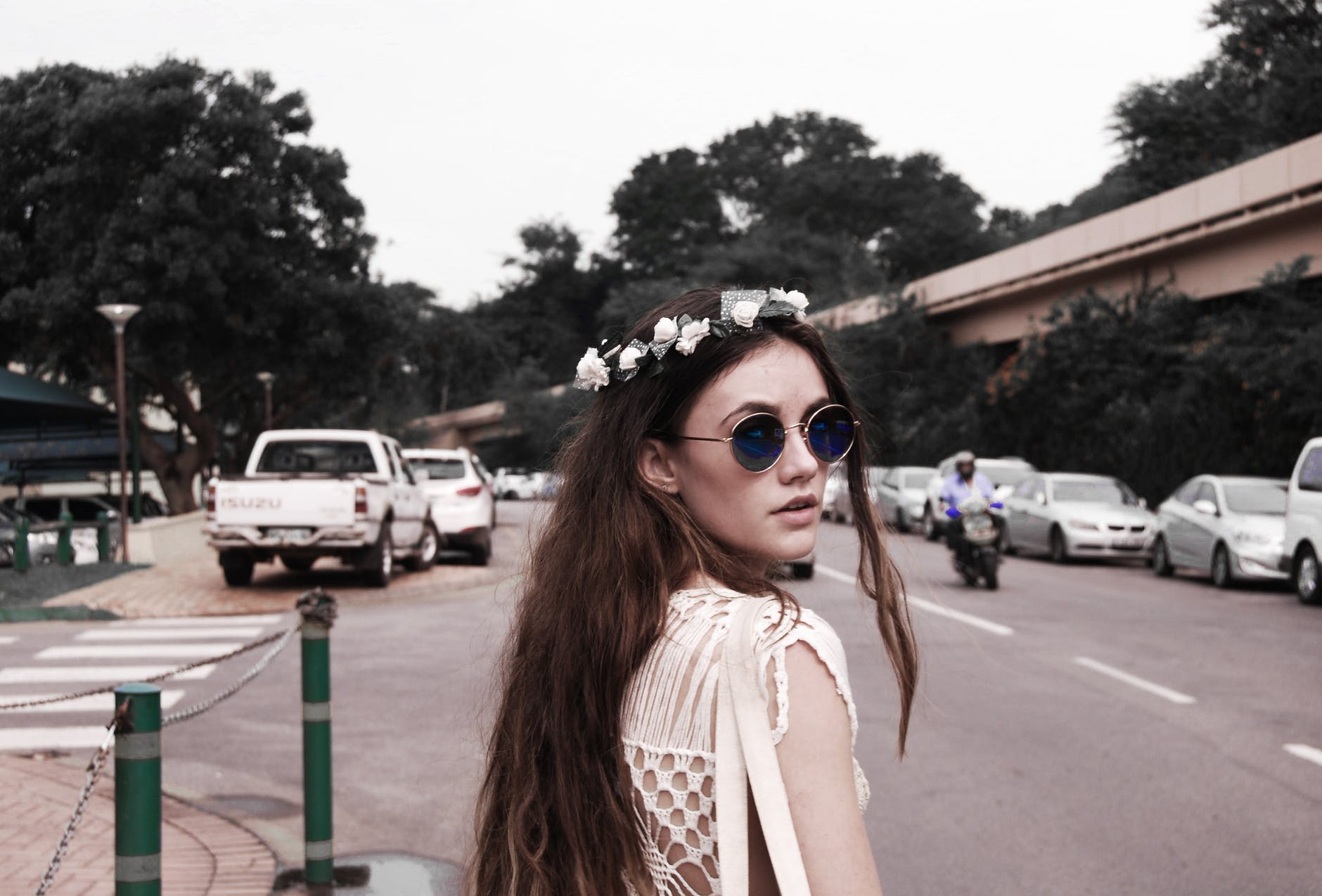 photography of a woman wearing vintage sunglasses